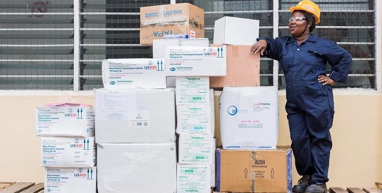 Warehouse worker in Ghana loading last mile deliveries