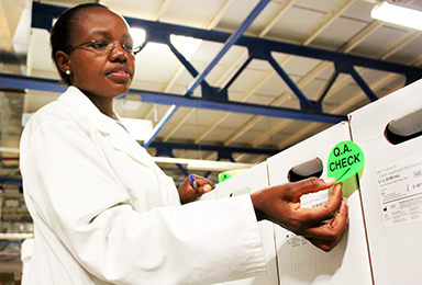 Woman with QA check sticker