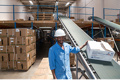 Man at conveyor belt