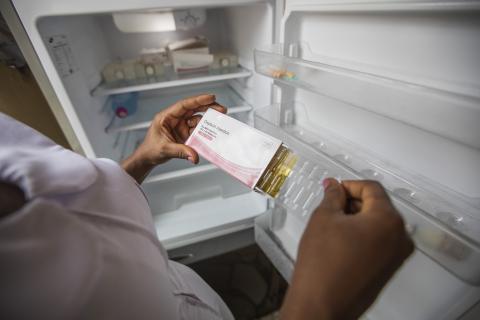 midwife holds temperature-controlled oxytocin package